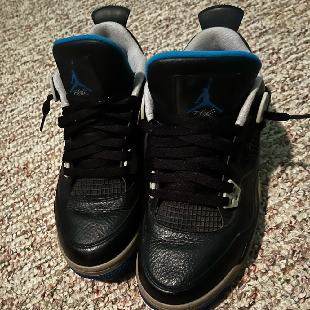 Blue and black Jordan 4